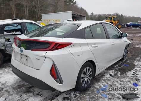 2021 Toyota Prius Prime Xle z USA, uszkodzony, nr VIN JTDKAMFP7M3176596